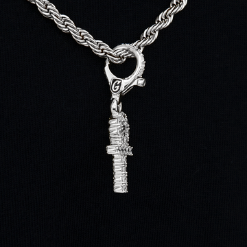 Colgante micro cruz Ankh de oro blanco con clip