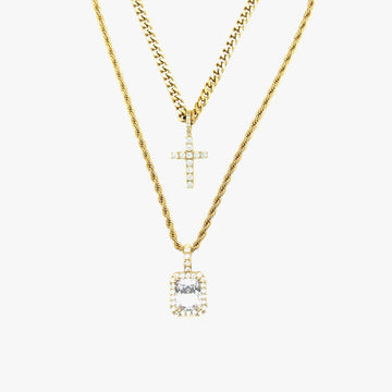 Cruz y piedra engastadas en oro amarillo