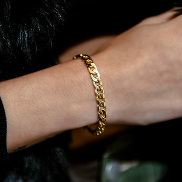 Pulsera de oro amarillo con cadena barbada - 6mm