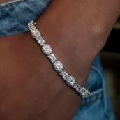 Pulsera de tenis con óvalos y esmeraldas talladas