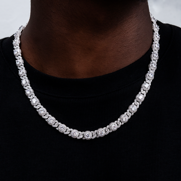 Cadenas cubanas de oro blanco con cruces de baguette, ojo turco y eslabones de diamantes, más pulsera a juego