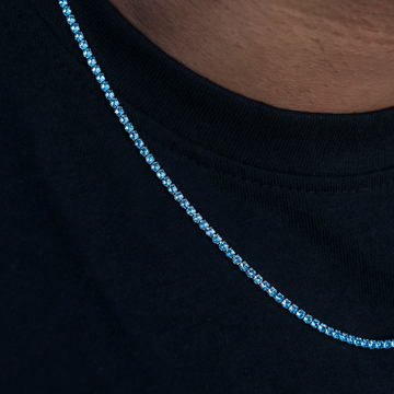 Cadena de tenis micro con diamantes y topacio azul en oro blanco