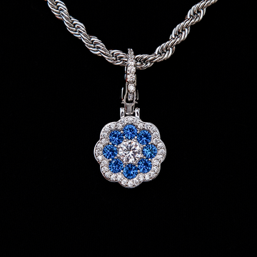 Colgante de flor azul con clip - Oro blanco