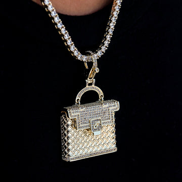 Colgante con clip para bolso con incrustaciones en oro amarillo
