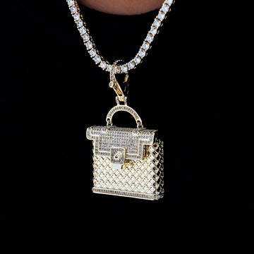 Colgante con clip para bolso con incrustaciones en oro amarillo