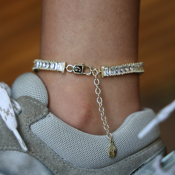 Tobillera de tenis con baguettes de diamantes en oro amarillo