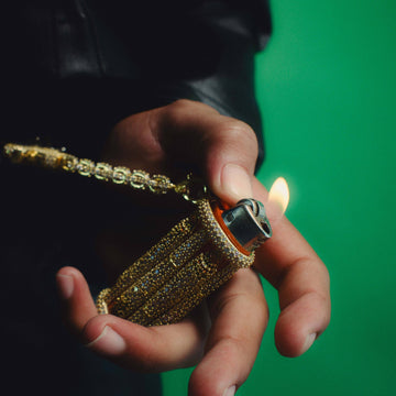 Encendedor It's Lit con funda y clip, color oro amarillo