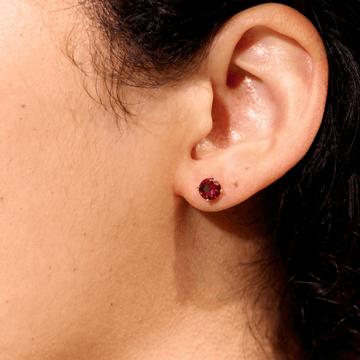 Ruby Round Cut Stud Earrings in White Gold