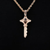 Colgante de estrella en oro rosa
