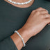 Pulsera Tennis con Piedras Redondas y Estrellas en Oro Blanco