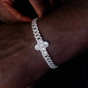 Pulsera de cruz redondeada con garras de diamante