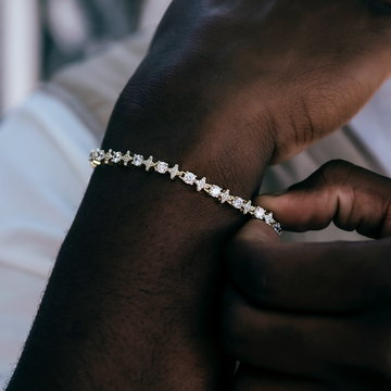 Pulsera de tenis de oro amarillo con estrellas y circonitas redondas