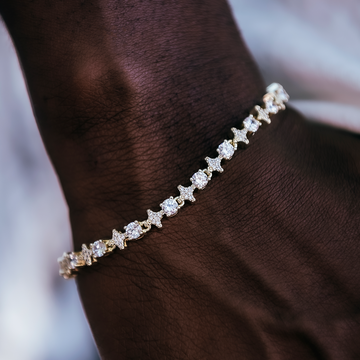 Pulsera de tenis de oro amarillo con estrellas y circonitas redondas