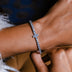 Pulsera de tenis con cruz
