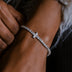 Pulsera de tenis con cruz