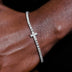 Pulsera de tenis con cruz