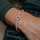 Pulsera de tenis de corazón en oro rosa