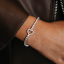 Pulsera de tenis con corazón en oro blanco