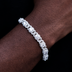 Cadenas cubanas de oro blanco con cruces de baguette, ojo turco y eslabones de diamantes, más pulsera a juego