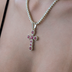 Ruby Stone Rounded Cross Pendant in Yellow Gold