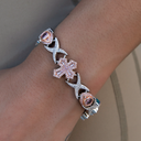 Pulsera de baguette de oro rosa con cruz y ojo turco