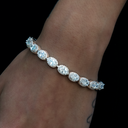 Pulsera de tenis ovalada con diamantes en racimo de oro blanco - 4 mm