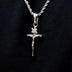 Colgante de crucifijo en oro blanco