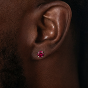 Aretes de oro blanco con rubí de talla redonda