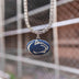 Colgante con el logotipo oficial de la NCAA de los Penn State Nittany Lions