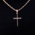 Colgante de cruz con circonitas de oro rosa