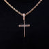 Dije de cruz con clavos y diamantes en oro rosa