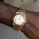 36 MM, bisel estriado Alpha Era® en oro amarillo