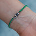 Pulsera micro tenis de esmeraldas en oro blanco