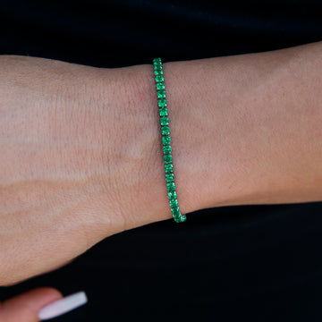 Pulsera micro tenis de esmeraldas en oro blanco