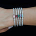 Pulsera de tenis de oro blanco con diamantes de roca de hielo de colores