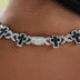 Collar de oro blanco con múltiples cruces de diamantes
