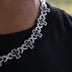 Collar de oro blanco con múltiples cruces de diamantes