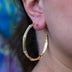 Iced Textured Bamboo Hoop Earrings in Yellow Gold