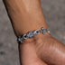 Iced Cruciform Flower Skull Cross Bracelet in White Gold