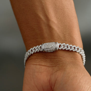 Pulsera con Cruz de Crucifijo Helada en Oro Blanco
