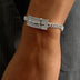 Pulsera con Cruz de Crucifijo Helada en Oro Blanco