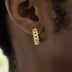 Pendientes de aro con garras de diamantes en oro amarillo