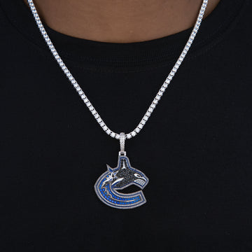 Colgante con el logotipo oficial de los Vancouver Canucks de la NHL en oro blanco