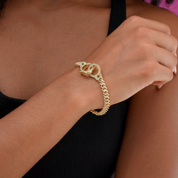 Pulsera de eslabones cubanos con engaste de diamantes en oro amarillo
