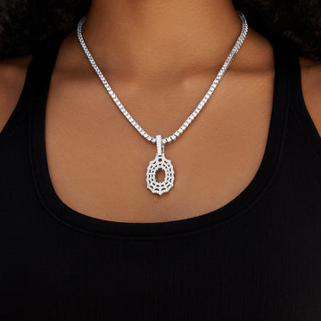 Dije de telaraña con diamantes en oro blanco