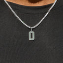 Dije número Micro Block en oro blanco