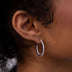 Pendientes de aro pequeños eternos de oro blanco macizo de 14k en oro blanco con diamantes VS