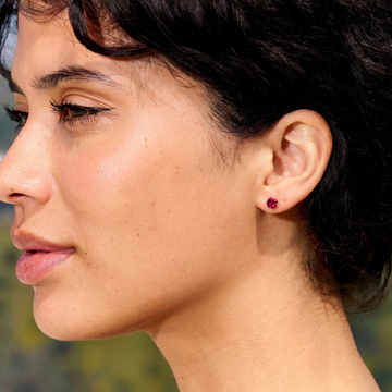 Ruby Round Cut Stud Earrings in White Gold