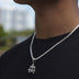 Dije Micro Cruz Triple Helada en Oro Blanco