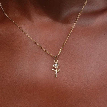 Solid Gold Micro Flower Pendant-VS Diamonds